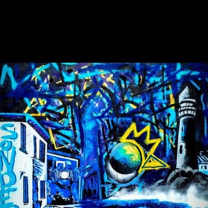 Blue graffiti-style painting with a lighthouse, glowing orb and yellow marks